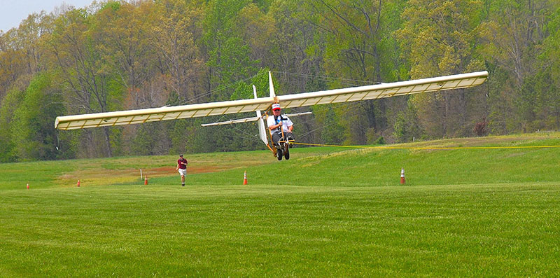Tom Tyndall becomes airborne with the Glider still on the tow-line.